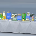 Colorful Coffee Break Area With Tiered Cakes Drinks And Flower Decorations