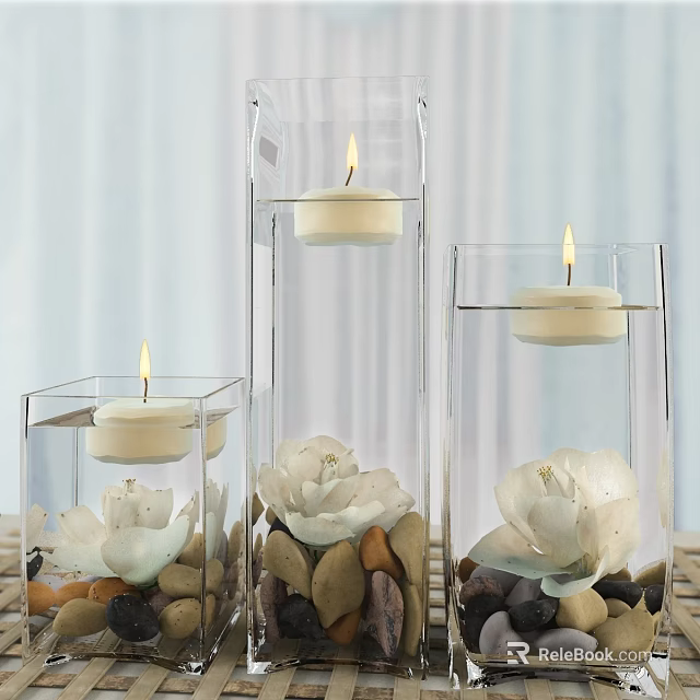 Transparent Glass Candle Lamps With Lit Candles White Flowers And Pebbles On Tabletop 3d model 
