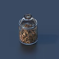 Transparent Glass Storage Jar With Glass Lid Containing Brown Granules For Home Use