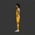 Man Wearing Yellow Soccer Jersey With Blue Sleeves Timer Logo Yellow Shorts And White Cleats