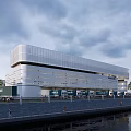 Modern Industrial Park Building With Waterfront Walkway Pedestrians And Retail Shops