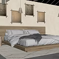 Hotel Guest Room Featuring Wooden Headboard White Bed Linens Gray Blanket And Framed Wall Artworks