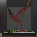 Contemporary Indoor Landscape With Hanging Scoop Structures Flowing Red Particles Green Moss Stones White Pebbles