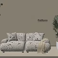 Modern Two Seater Sofa with Black White Abstract Pattern Beige Wall Floor Lamp Palm Plant