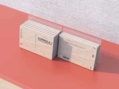 Stacked Formula 1 Notebooks With Transparent Cover On Red Table And Light Wall Background 3d model
