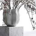 Textured White Vase with Branches and Red Berries on Gray Cube Pedestal Against White Background