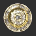 Circular Sculptural Carving With Gold Silver Decoration Intricate Central Patterns And Relief Edges