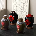 Traditional Chinese Wine Jars With Red Characters On Wooden Table Near Window And Decorative Painting