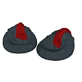 Two Blue Bean Bag Chairs With Red Scarves On Marble Floor And Light Wall