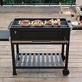 Camping Site Outdoor Grill Setup With Dining Table Food And Green Trees