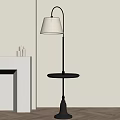 Floor Lamp With Metal Pole Black Tray Base White Lampshade Near White Shelf And Candles