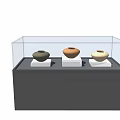 Black Display Cabinet With Transparent Glass Cover And Ceramic Vases On White Bases