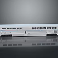 White Model Train Carriage with Multiple Windows Black Wheels and Reflection on Gray Background