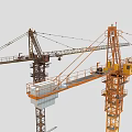 Yellow And Brown Tower Cranes With Extended Booms Operating Cabs And Steel Structures