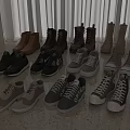 Various Boots Sneakers In Black Brown Gray Beige On Light Marble Floor With White Curtains