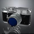 Vintage Electronic Camera With Silver Metal Body Blue Lens And Classic Design