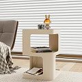 Modern White Coffee Table With Layered Design Mug Rabbit Figurine Books And Magazines