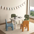 Colorful Kids Table with Green Blue Orange Chairs Bunting Flags and Window View on Rug