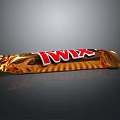 Twix Chocolate Bar With Golden Wrapper And Red Brand Logo
