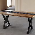 Wooden Dining Table With Dark Resin Strip And Black X Shaped Legs In Minimalist Interior