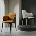 Modern Elegant Dining Chairs With Orange Green Upholstery Backrest Armrests On Display Stand