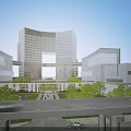 Modern Glassy Office Building Complex With Connected Structures And Surrounding Greenery