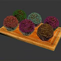 Delicious Chocolate Truffles Arranged On Orange Wooden Board With White Wrappers