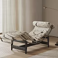 Modern Patterned Lounge Chair With Black Frame In Living Room With Floor Lamp