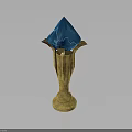 Blue Crystal Gemstone On Golden Decorative Stand With Petal Design