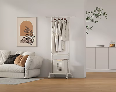 White Rolling Clothes Rack With Hanging Clothes Storage Basket And Decorative Painting In Living Room 3d model