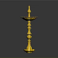 Golden Ornate Candlestick With Tall Stand And Decorative Carvings Shiny Surface
