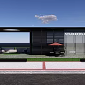 Modern Starbucks Coffee Shop Exterior With Glass Facade Outdoor Seating And Green Lawn