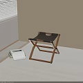 Foldable Leisure Chair with Wooden Frame and Gray Cushion in Minimalist Room Near Book