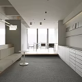 Modern Public Office Space With Open Layout Sofa Seating And Large Windows