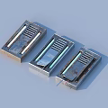 Three Shiny Metal Rectangular Components Featuring Striped Design On Light Blue Background