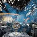Luxurious Banquet Hall Interior Design With White Petal Ceiling Blue Lighting And Arched Accents