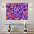 Abstract Purple Orange Painting Above Glass Console Table With Striped Legs And Wall Sconces