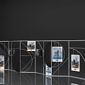 Modern Exhibition Display With Geometric Frames And Hanging Photos On Reflective Floor