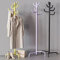 Stylish Yellow And Purple Coat Racks With Coats Scarves And Handbag