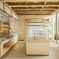 Modern Dessert Shop Interior With Wooden Ceiling Glass Display Cases And Pastry Shelves