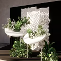 Elegant White Decorative Structure With Green Plants On Black Display Stand 3d model