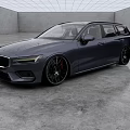 Dark Blue Volvo Estate Car With Sleek Design And Black Alloy Wheels