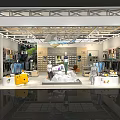 Modern Clothing Store Interior With Bright Lighting And Multiple Display Areas 3d model