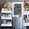 Stylish Bathroom Accessories Display On White Shelves With Baskets Bottles Towels And Decorative Elements