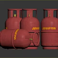Red Indane Brand LPG Cylinders Standing And Lying On Black Surface