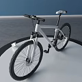 Minimalist Mountain Bicycle With White Frame And Black Wheels In Indoor Studio