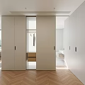 Modern Walk in Closet Interior With White Cabinets Open Hanging Area And Herringbone Wood Floor