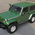 Green Two Door Off Road Vehicle With Front Grille Large Tires And Hardtop Design