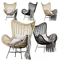 Modern Rattan Leisure Chair With Beige Black Design Soft Pillows And Stylish Blankets