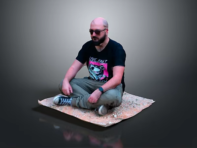 Man Sitting On Carpet Wearing Black T-Shirt With Glasses And Hands On Knees 3d model